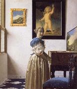 JanVermeer A Young Woman Standing at a Virginal oil painting picture wholesale